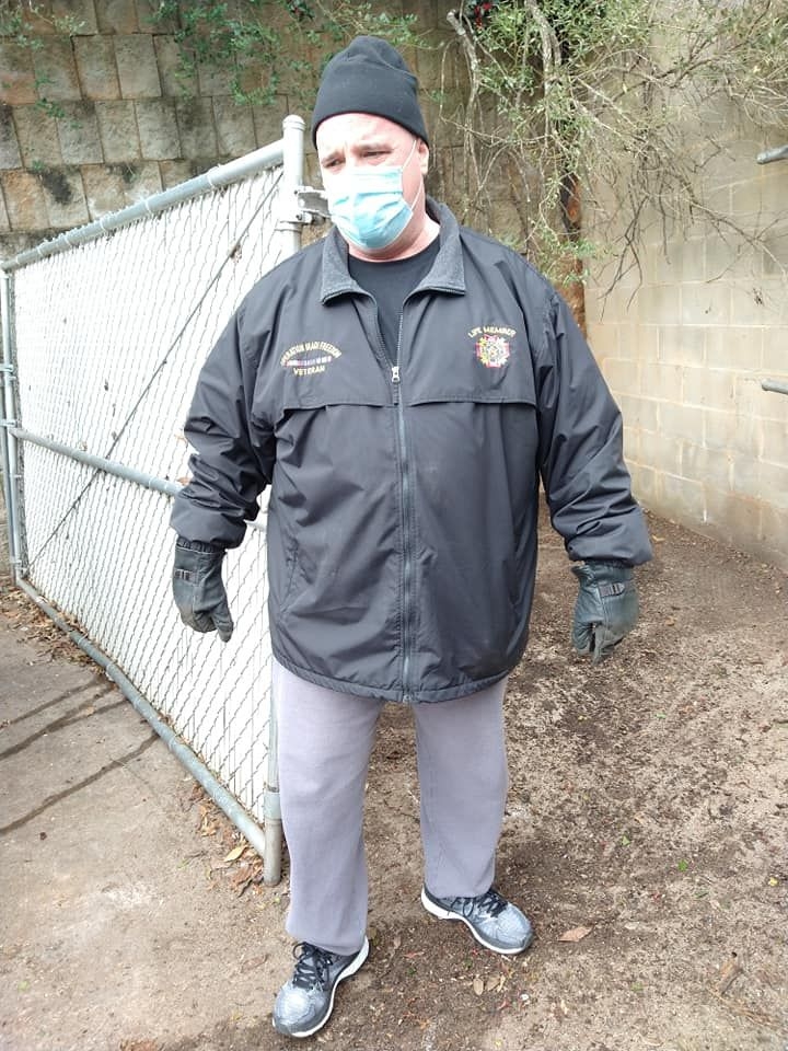Comrade Demers assisting in the illegal dumping clean up. 